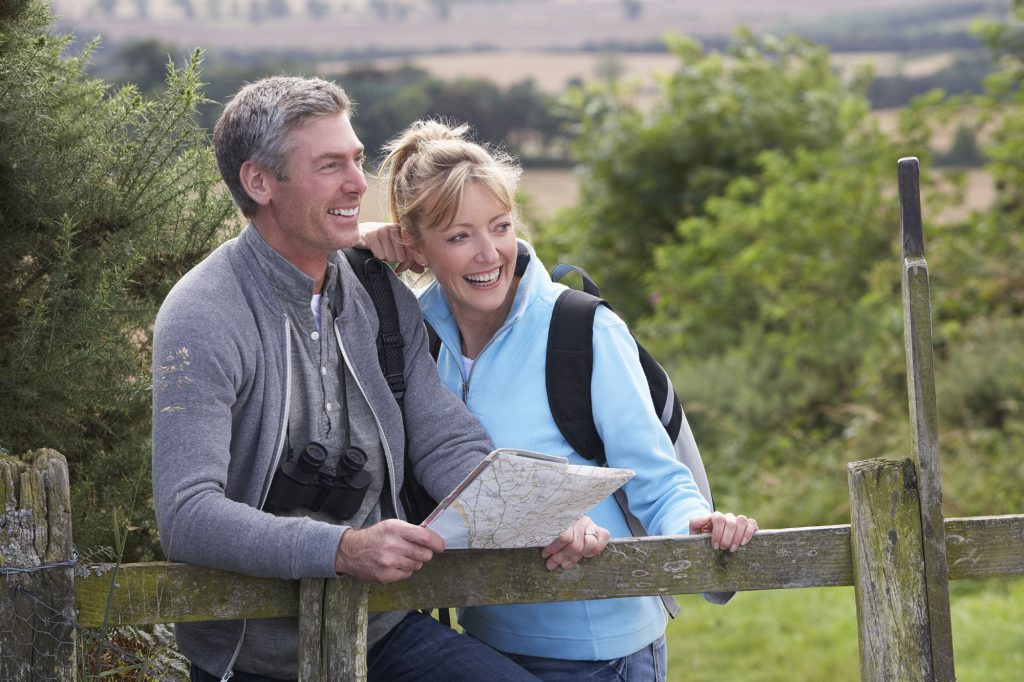 Happy couple hiking in nature