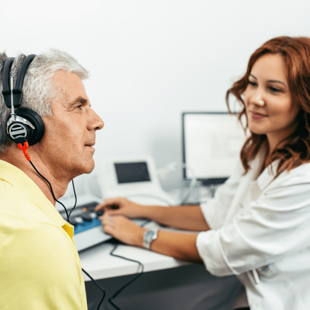 Man doing hearing test at an audiologists office