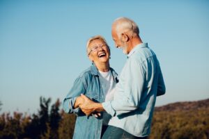 Happy active senior couple outdoors
